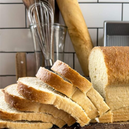 Several slices of beginner friendly sandwich bread coming off the loaf.