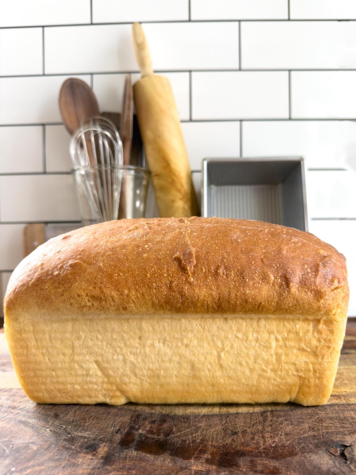 A side view of a loaf of beginner friendly sandwich bread.