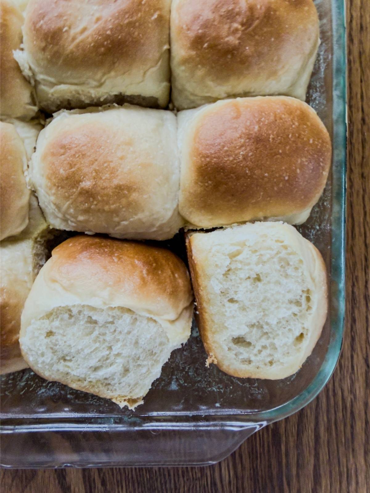 Soft & Fluffy Homemade Dinner Rolls in a glass dish.